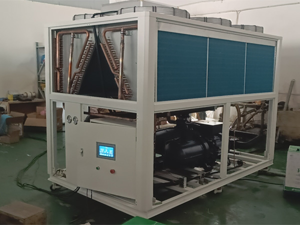 Was ist der Unterschied zwischen einem luftgekühlten Scrollkühler und einem luftgekühlten Schraubenkühler?